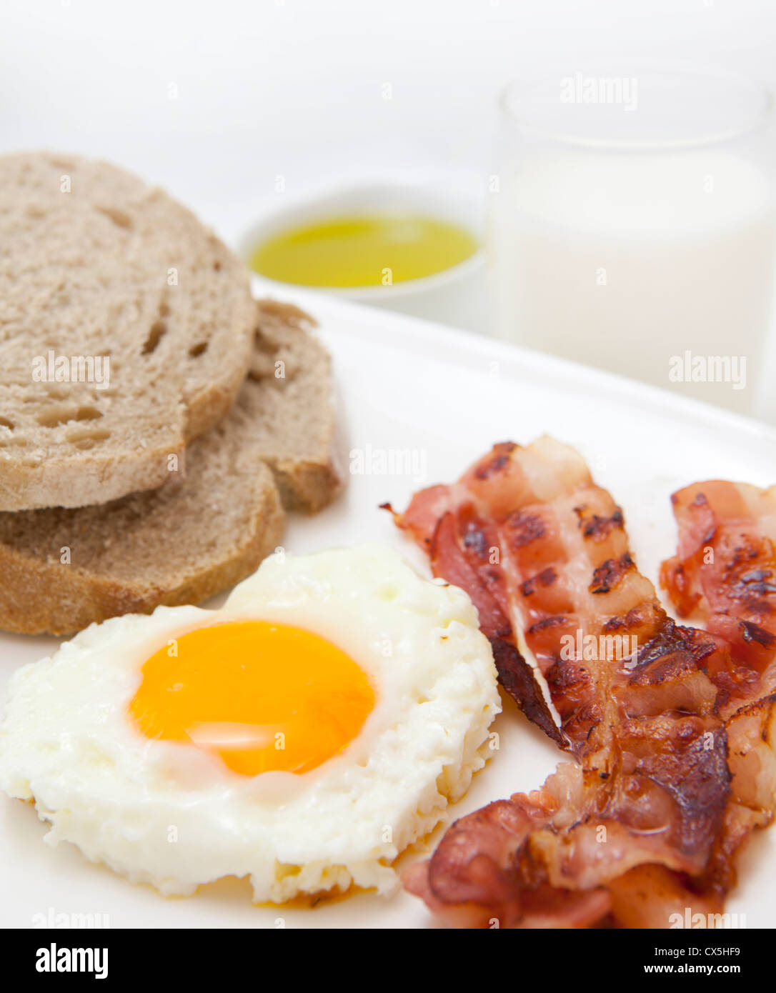 food background with fresh egg and crispy bacon Stock Photo - Alamy