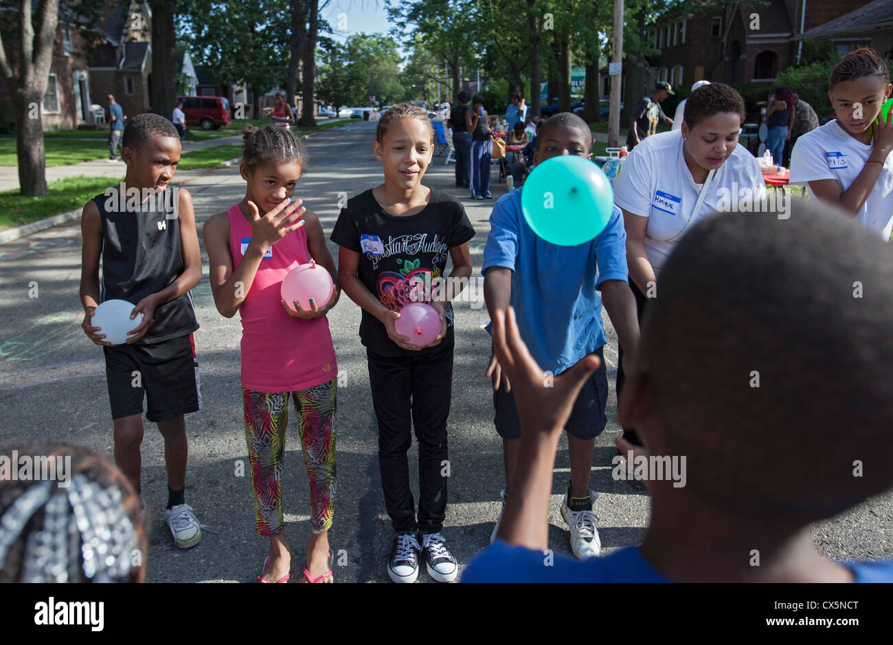 Children Toss Water Balloons at a Detroit Block Party Stock Photo Alamy