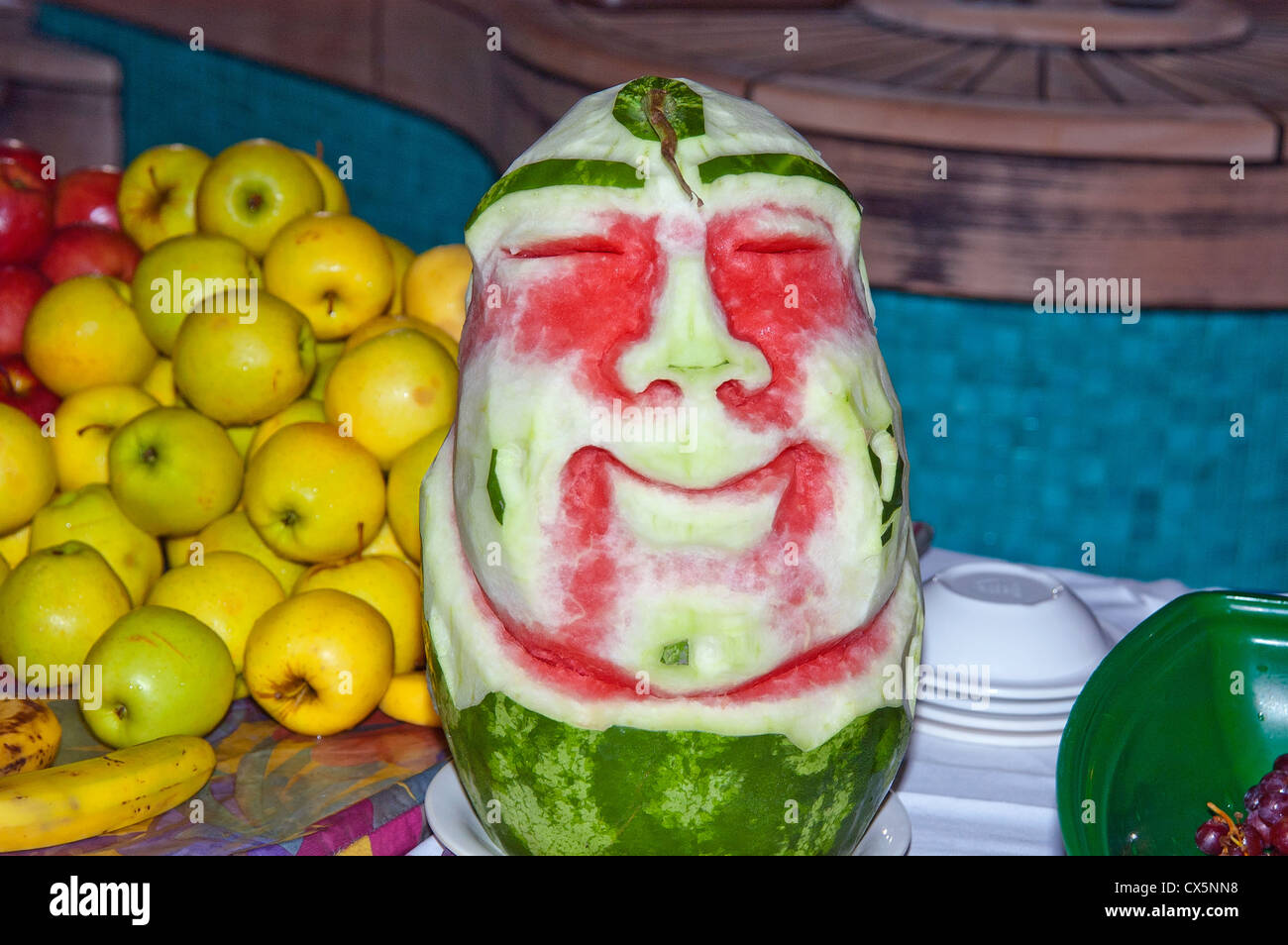 Mask carved from watermelon , Night Party,  Cruise Ship Stock Photo