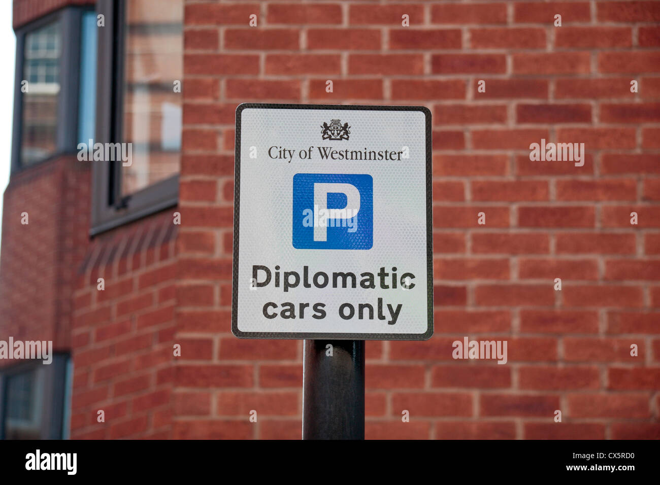 A City of Westminster parking sign for "Diplomatic cars only" above a