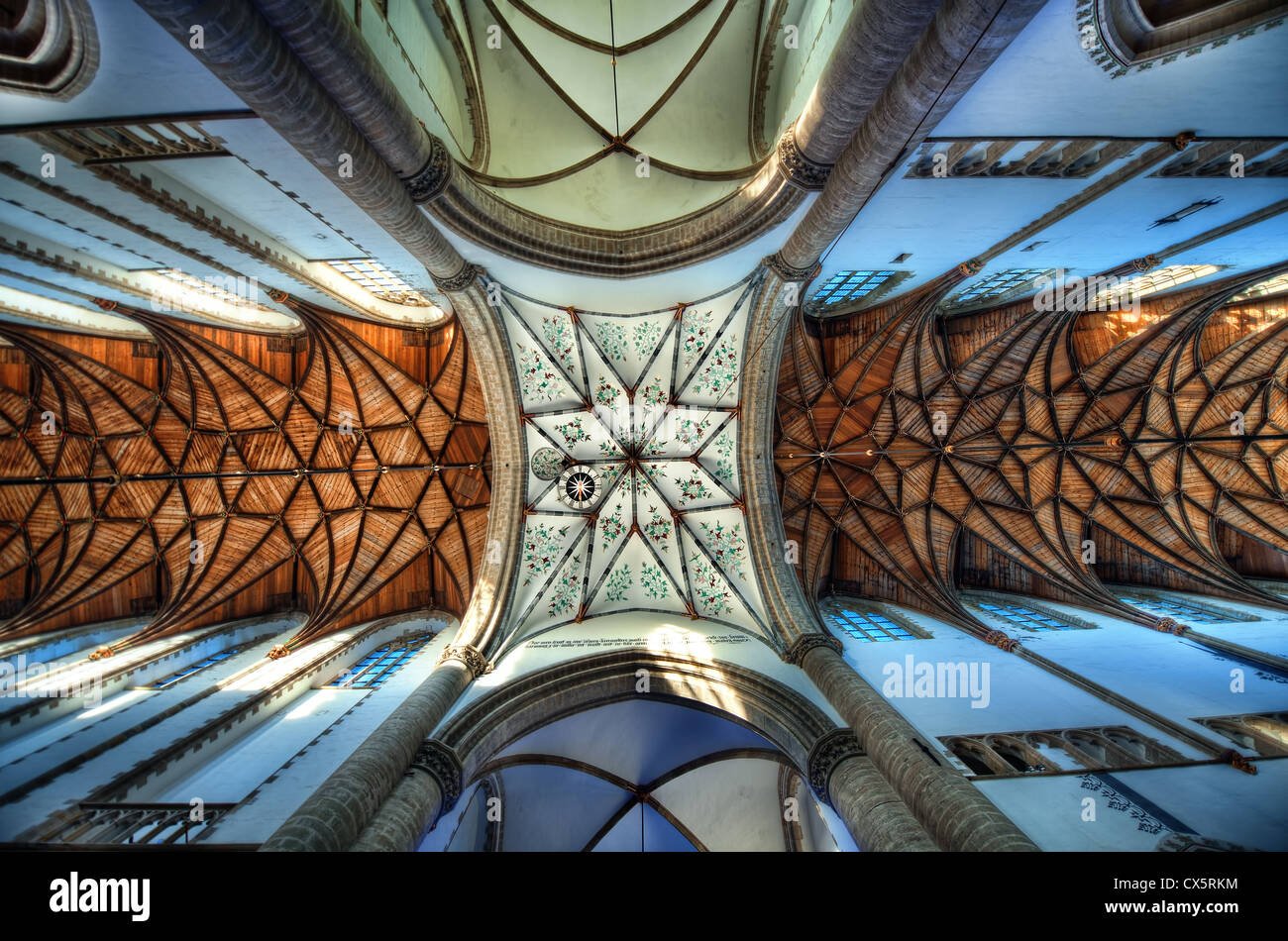 The ornate ceiling of the Gothic Cathedral of Saint Bavo in Haarlem, Netherlands. The cathedral is also known as the Grote Kerk. Stock Photo