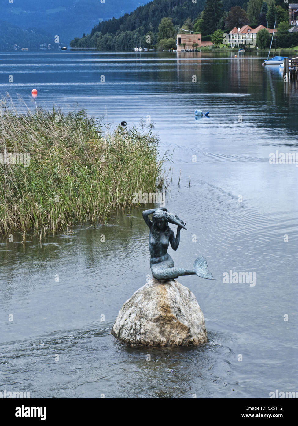 Seeboden on Milstatter lake in Carinzia, Austria. Siren bronze statue Stock Photo