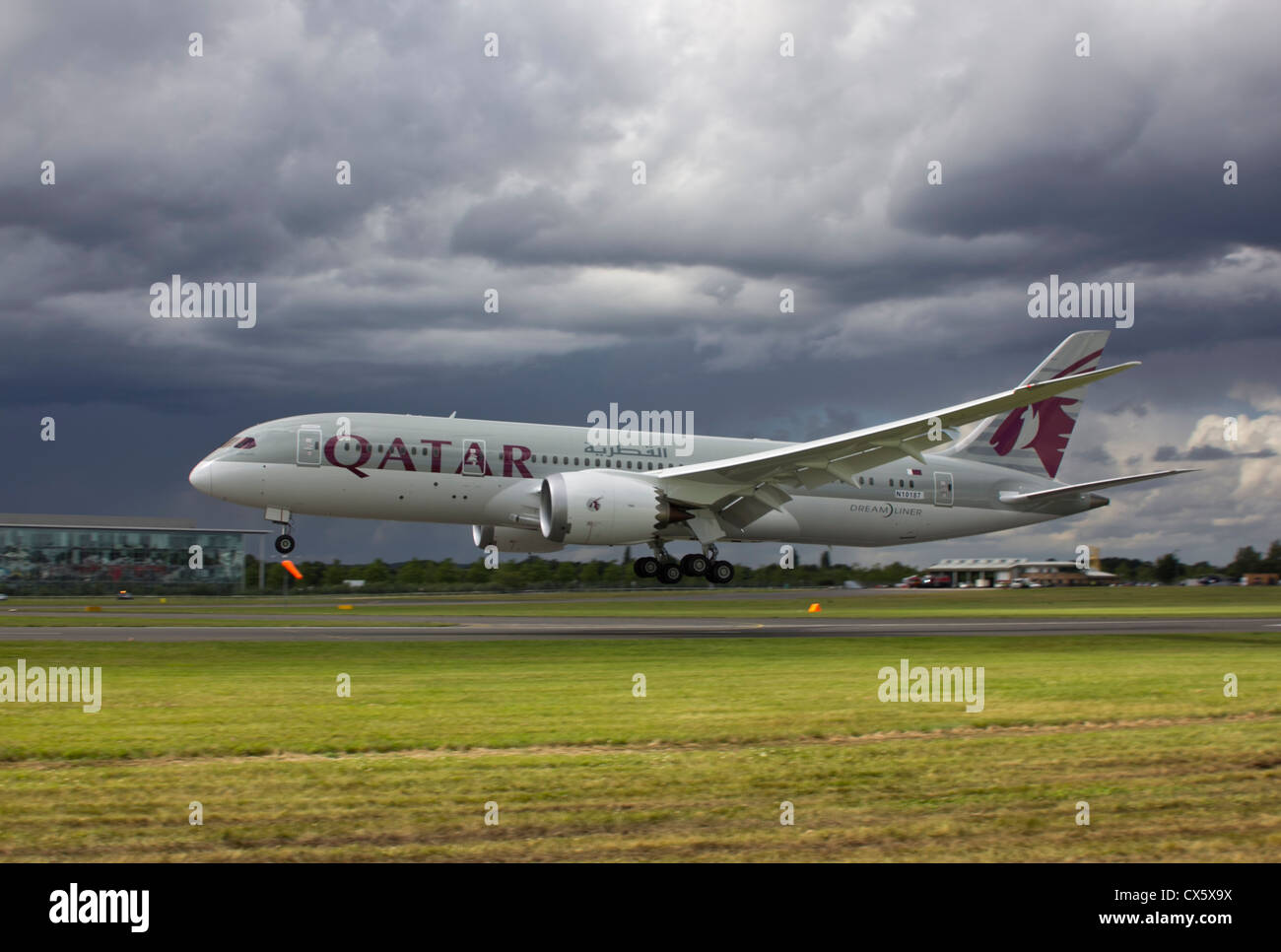 Boeing 787 Dreamliner of Qatar Airways comes in to land at Farnborough International Airshow 2012 after a demonstration flight Stock Photo