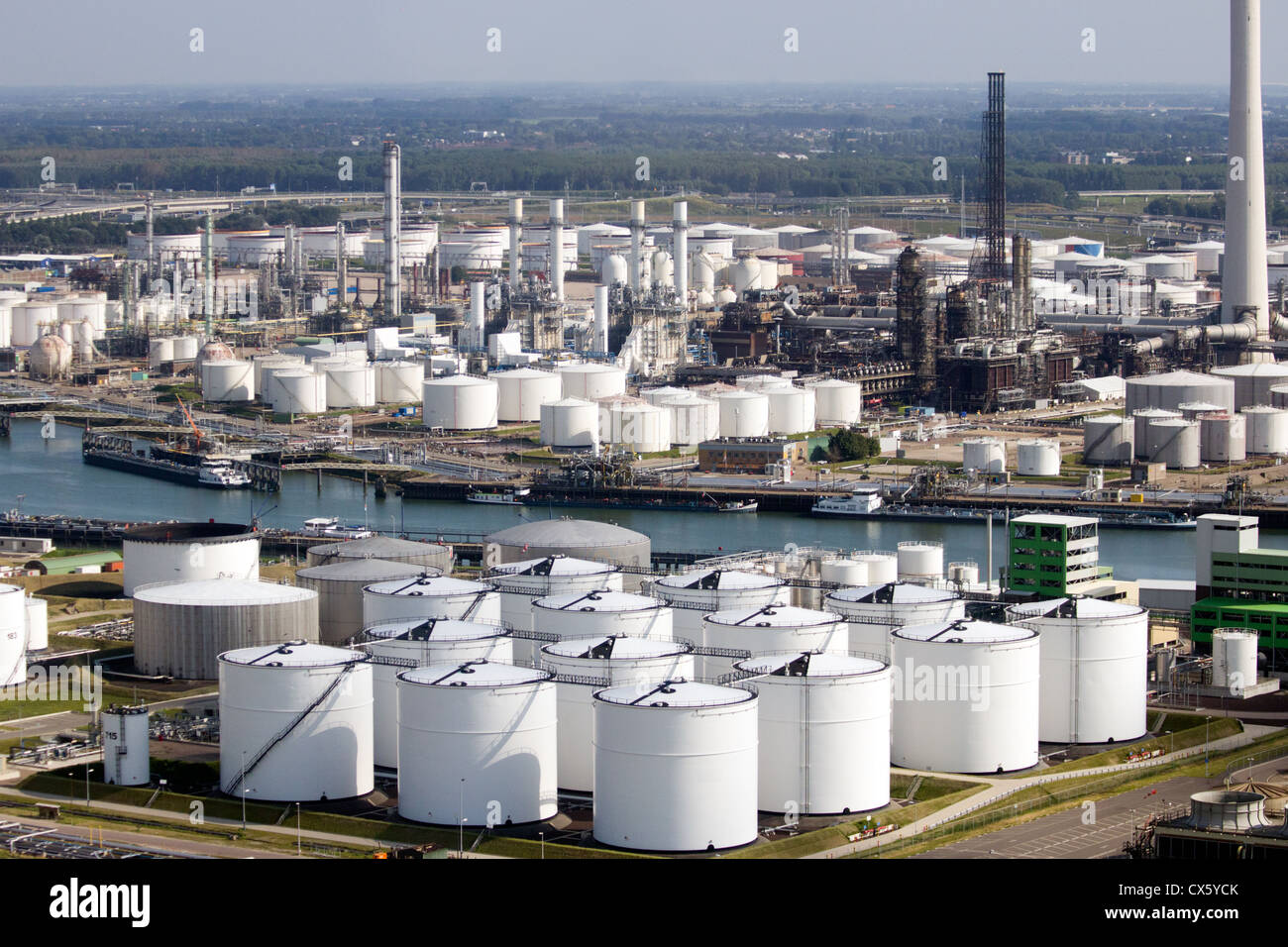 Aerial view of the port of Rotterdam with oil refinery storage tanks Stock Photo