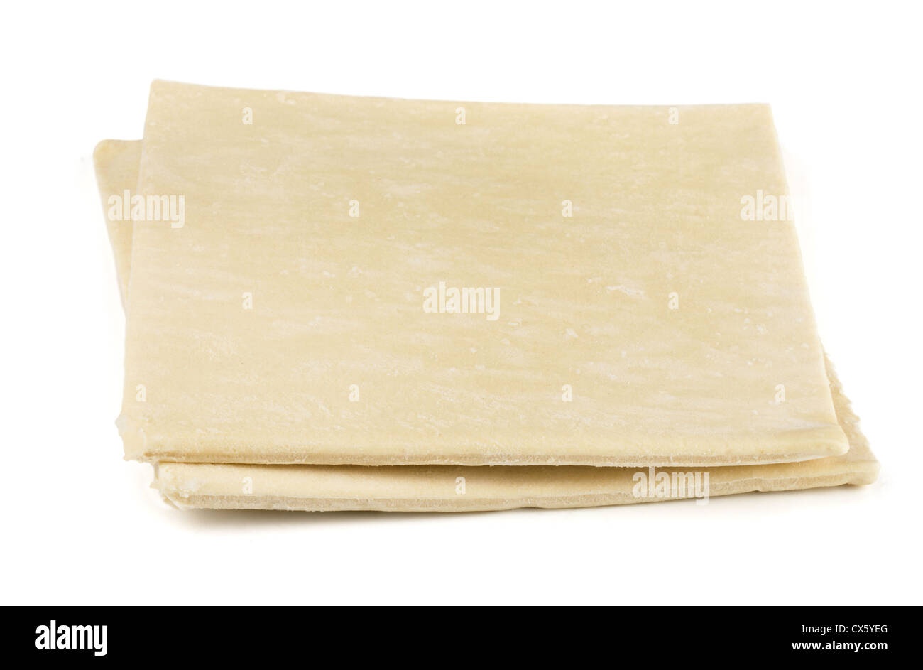 Two sheets of frozen puff pastry isolated on white Stock Photo