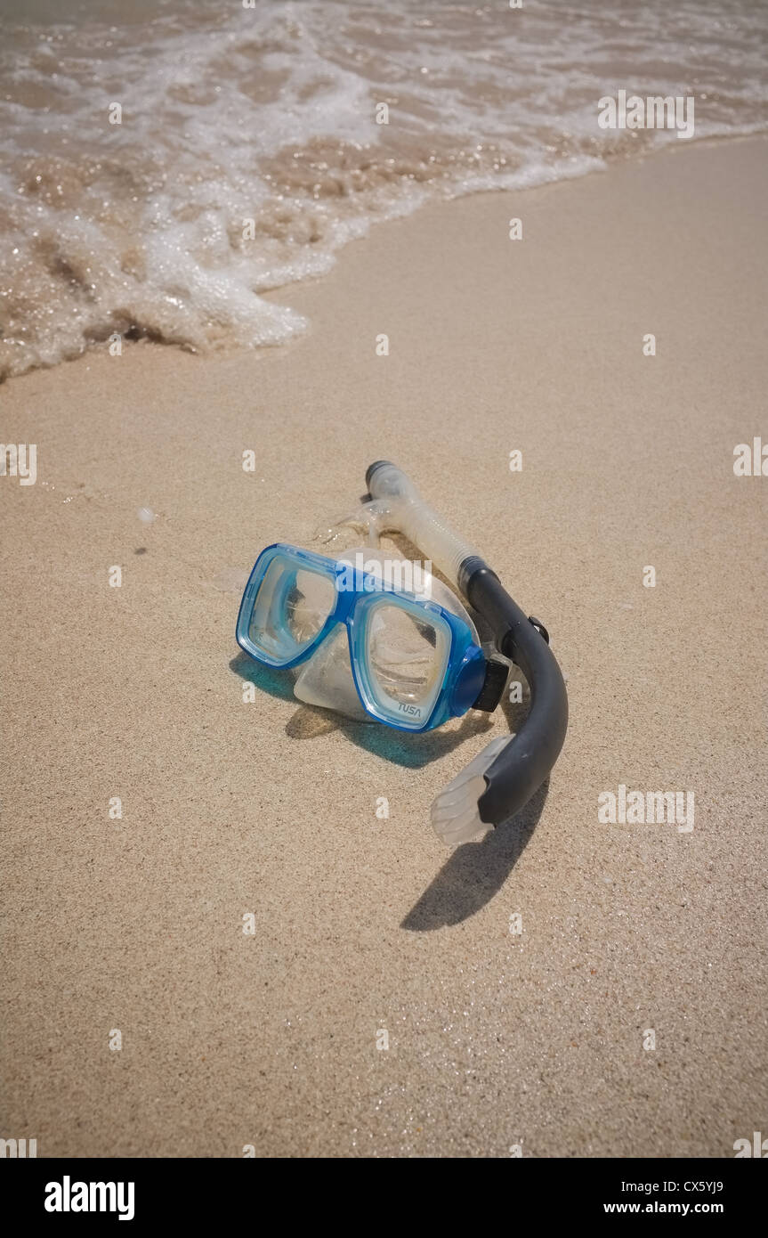 a snorkel mask lying in the golden sand on a beach Stock Photo - Alamy