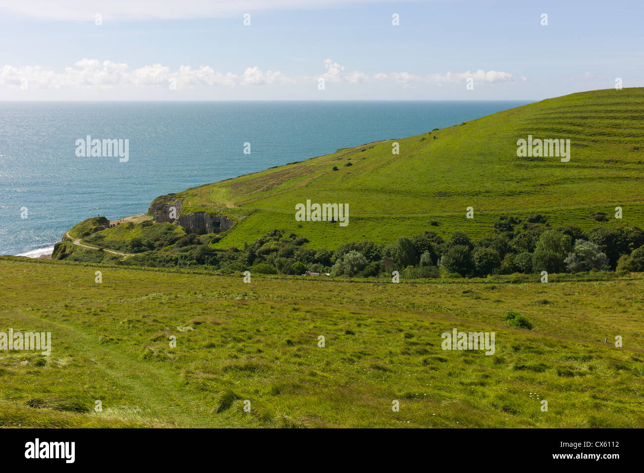 Coastal footpath looking towards Winspit Quarry and out to sea at Worth ...