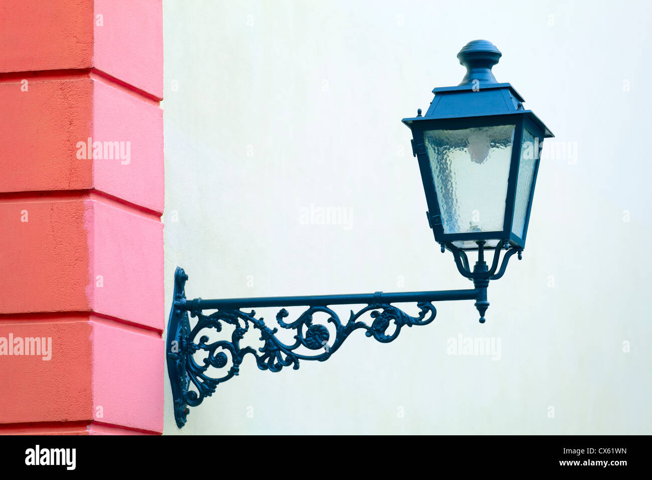 Old electric street lamp on house facade in small city Saarburg, Rheinland-Pfalz, Germany Stock Photo