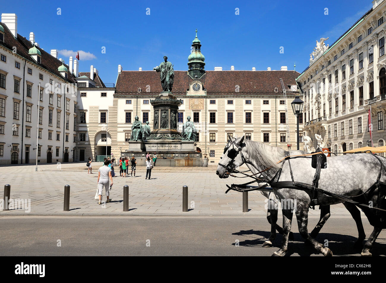 Hofburg palace with horses in foreground, centre of old historic Vienna Austria Europe Stock Photo