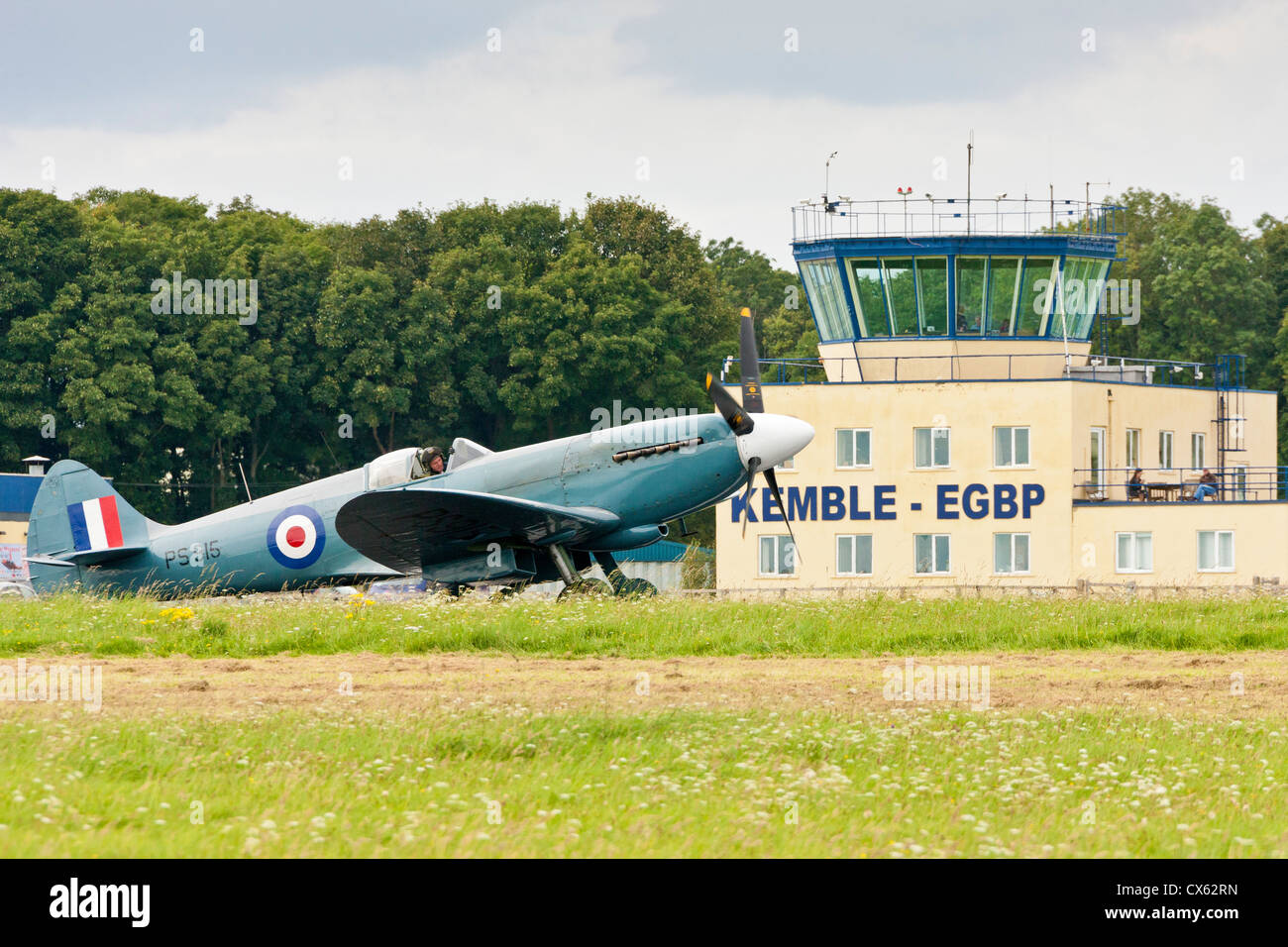 Hawker Hurricane aircraft on the runway passing the Kemble EGBP Control