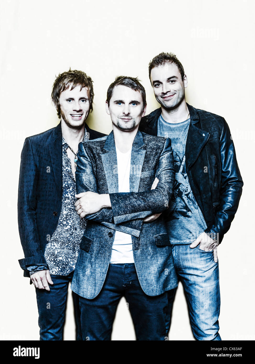 Paris, France - July 04, 2012: Portrait of the english rock group Muse with Matthew Bellamy, Dominic Howard and Christopher Wolstenholme at Paris, France on july 4th, 2012 Stock Photo