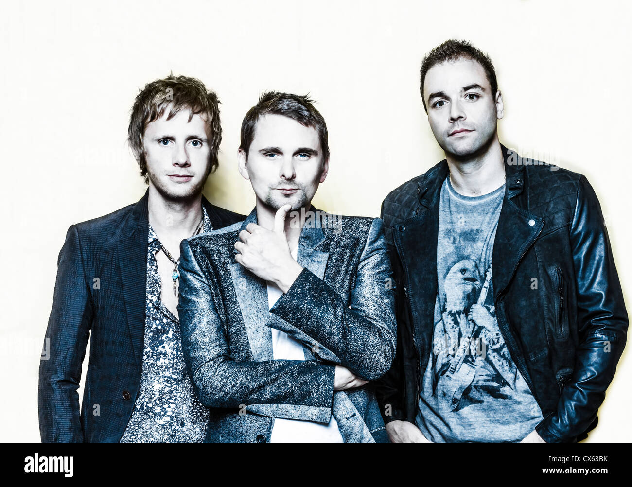 Paris, France - July 04, 2012: Portrait of the english rock group Muse with Matthew Bellamy, Dominic Howard and Christopher Wolstenholme at Paris, France on july 4th, 2012 Stock Photo