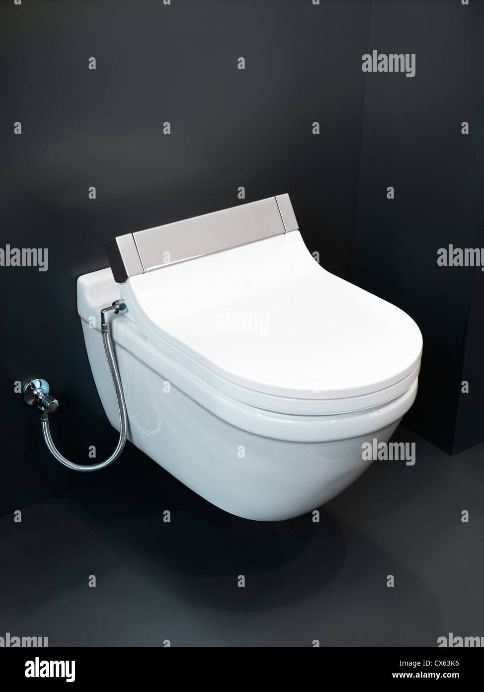 Modern wall mounted ceramic toilet Stock Photo