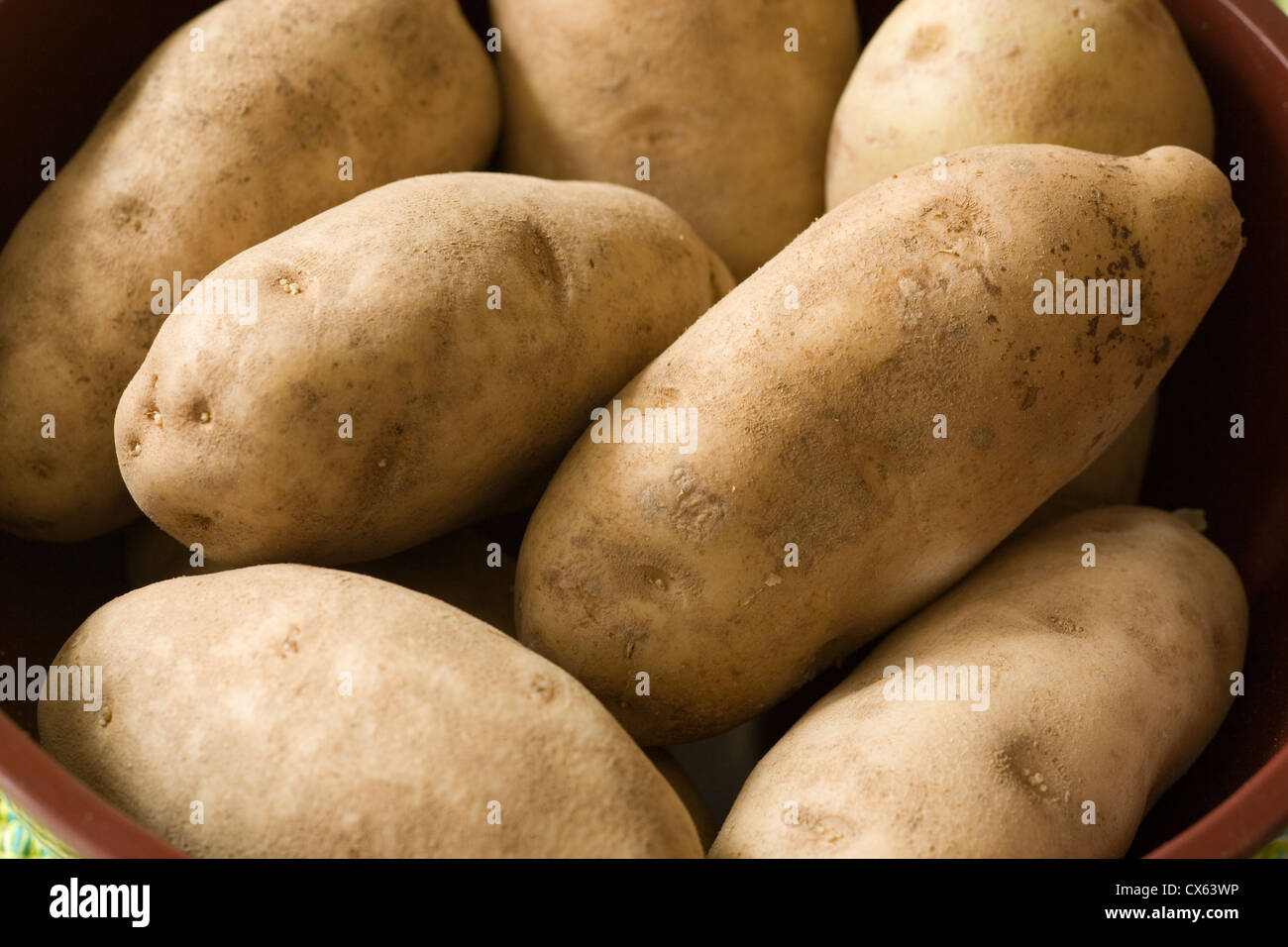 whole, raw, russet potatoes Stock Photo