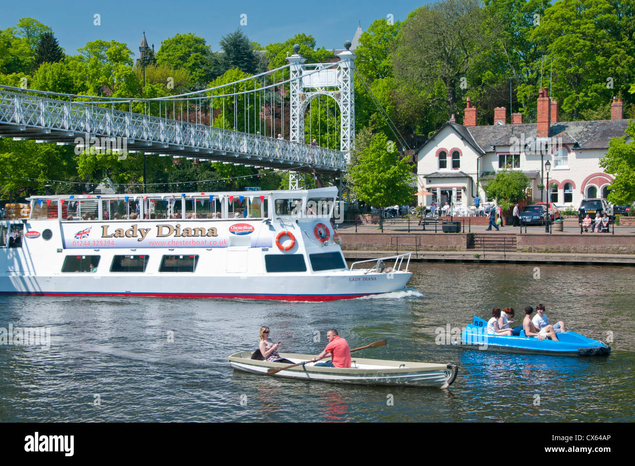 Pleasure & Tour Boats on River Dee Passing Under Queens Park Bridge, The Groves, Chester, Cheshire, England, UK Stock Photo