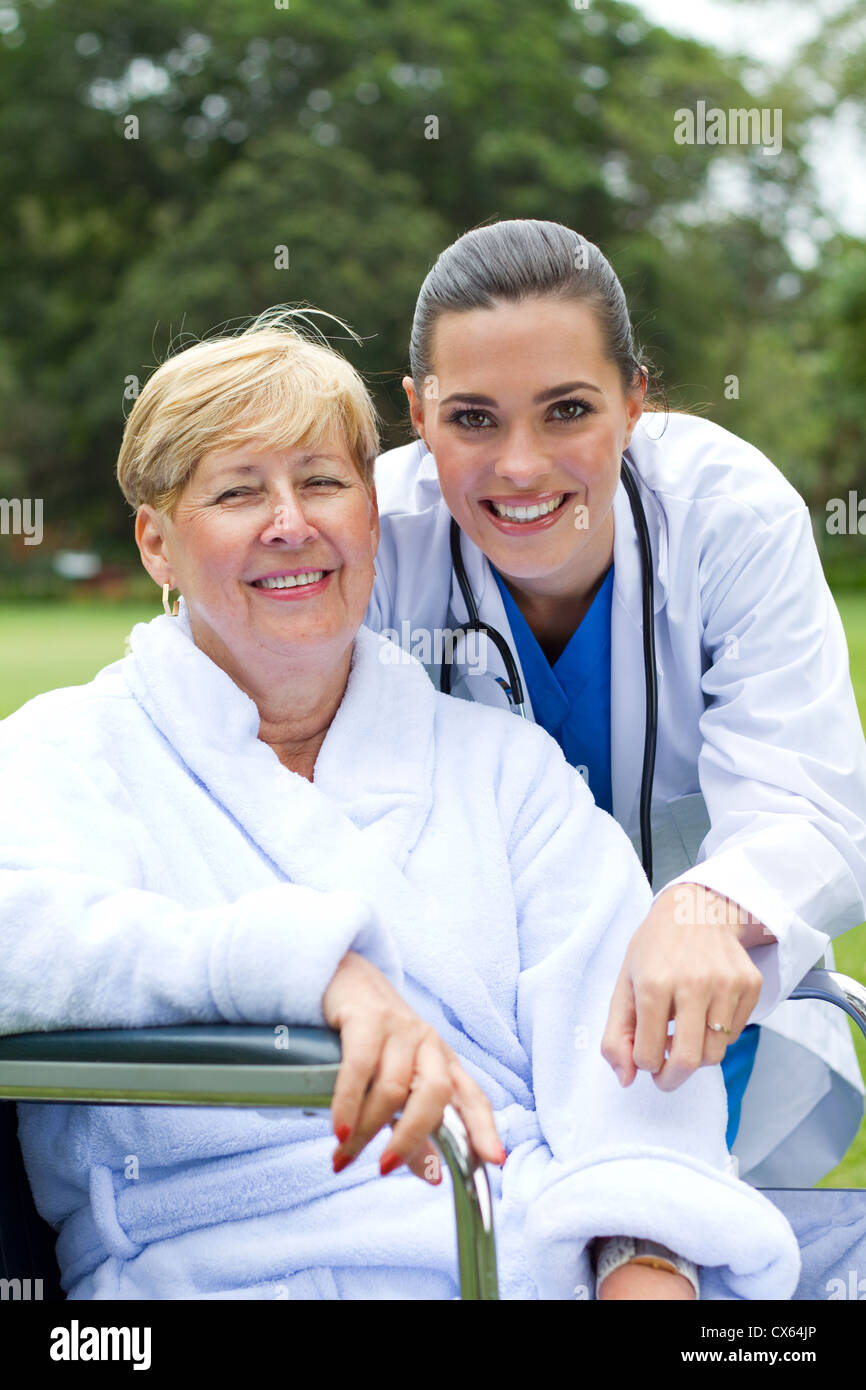 Happy doctor caring young hi-res stock photography and images - Alamy