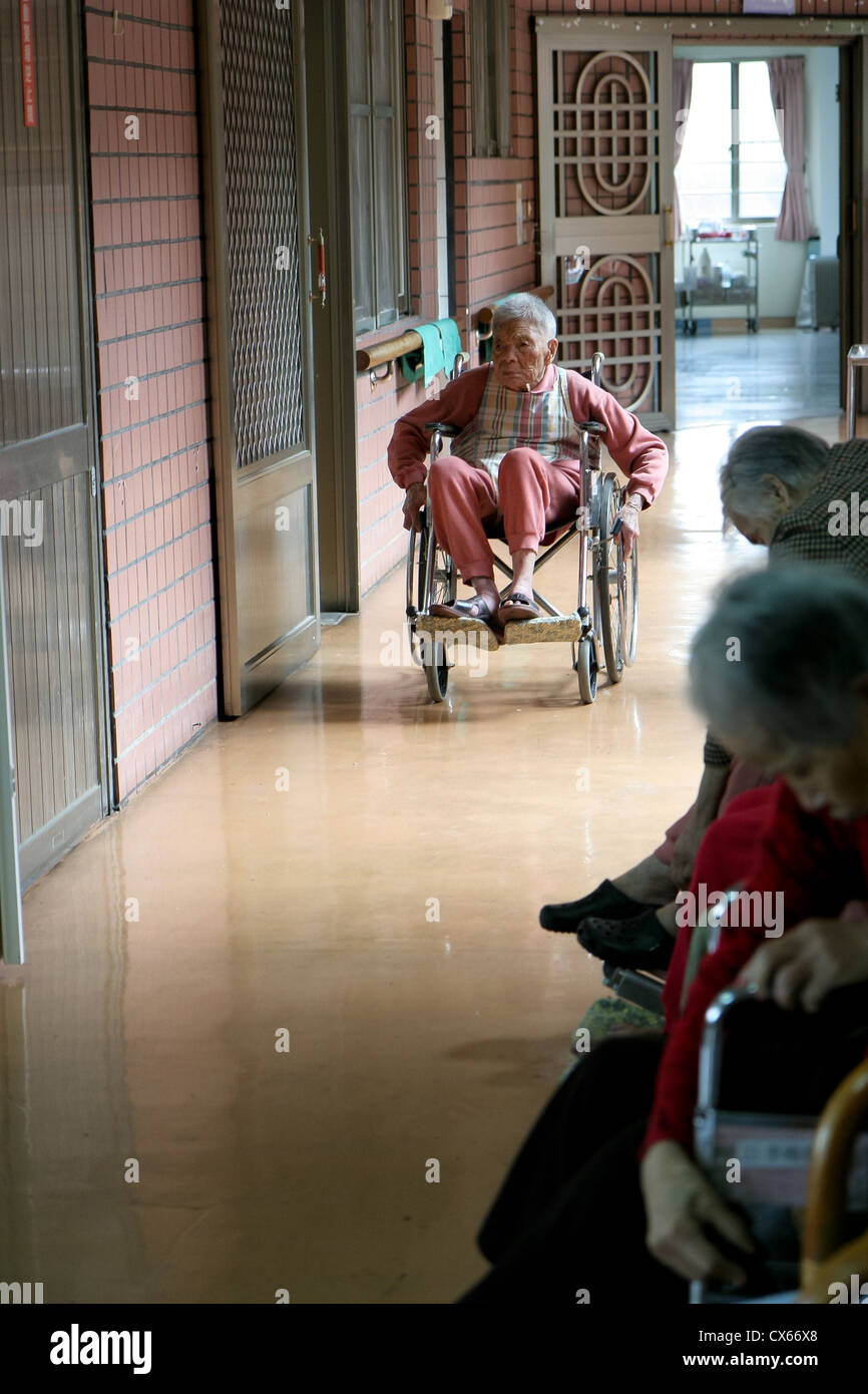 Old woman in wheelchair hi-res stock photography and images - Alamy