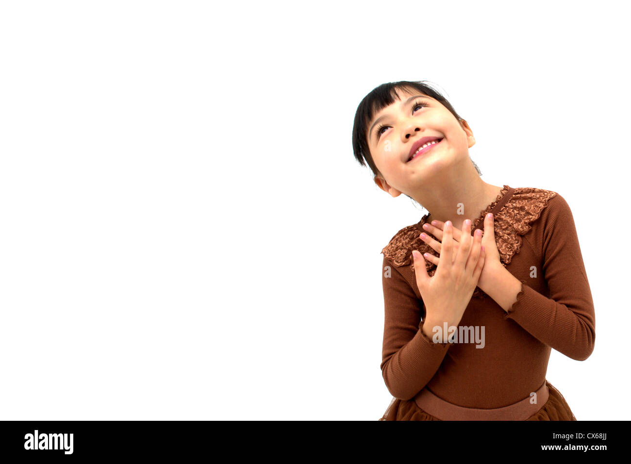 happy little girl on white background Stock Photo - Alamy
