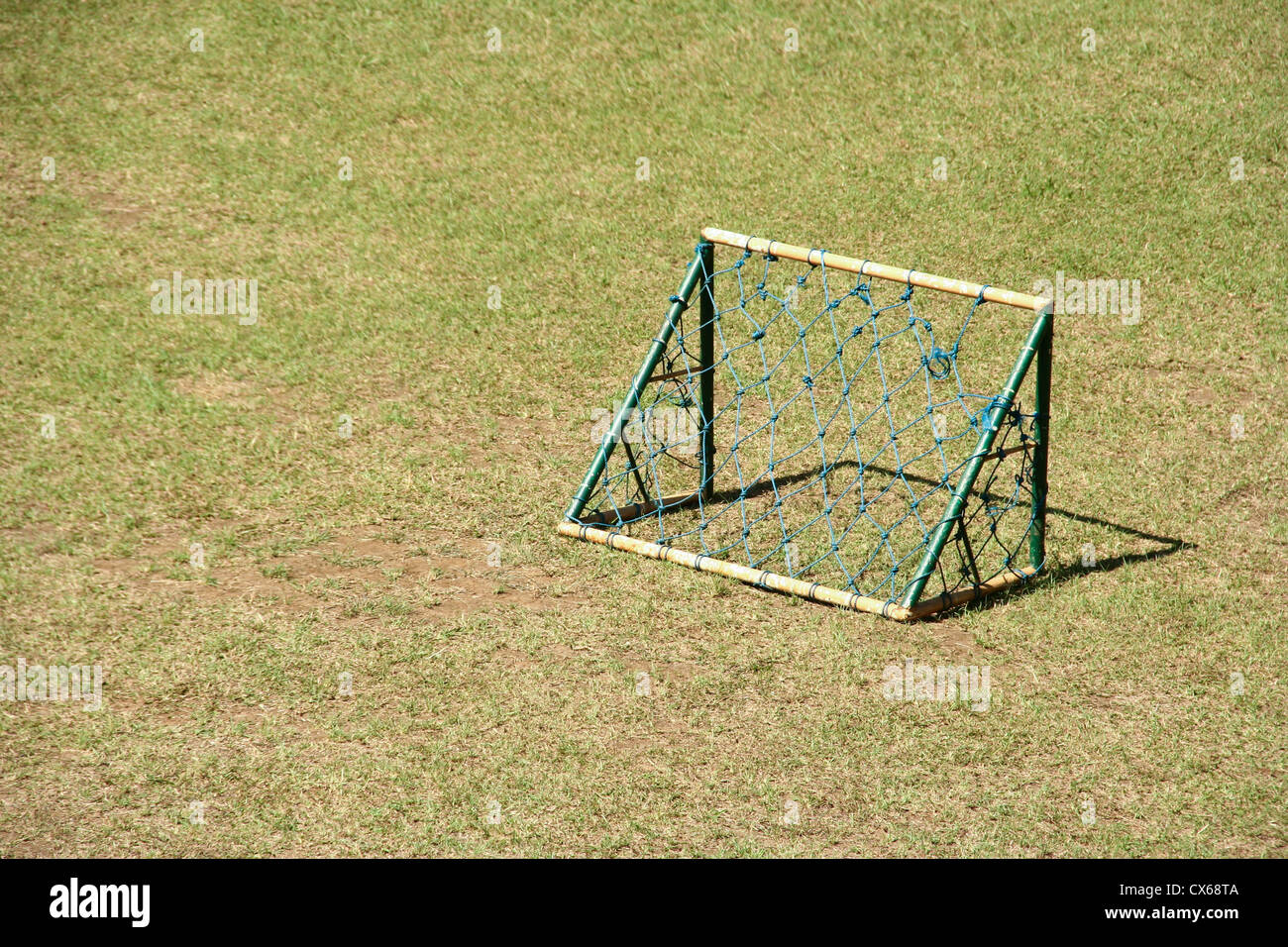 A mini soccer goal for kids on a mini soccer field. Stock Photo