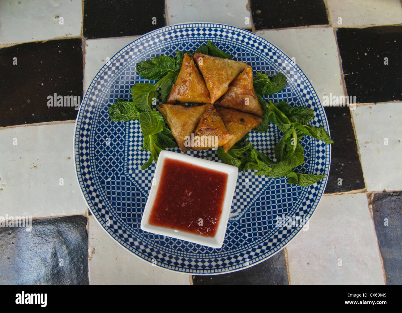 pastilla, Moroccan spring rolls, in Marrakech, Morocco Stock Photo - Alamy