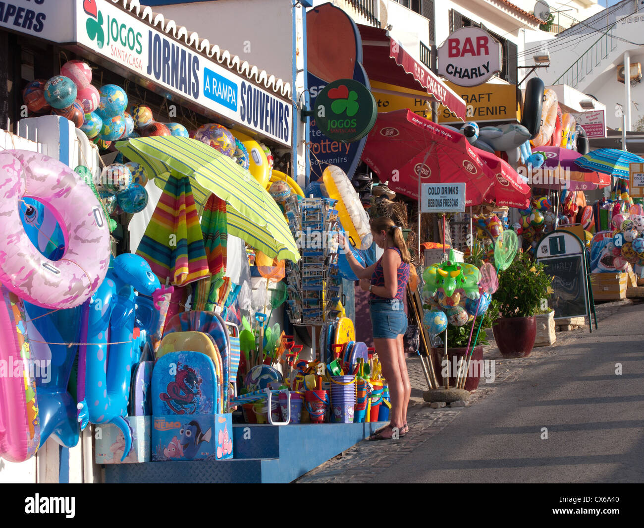 ALGARVE, PORTUGAL. Colourful shops selling beach toys and accessories