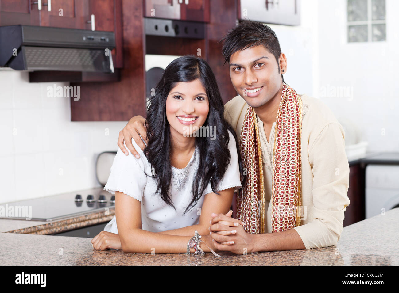 beautiful young Indian couple portrait at home Stock Photo - Alamy