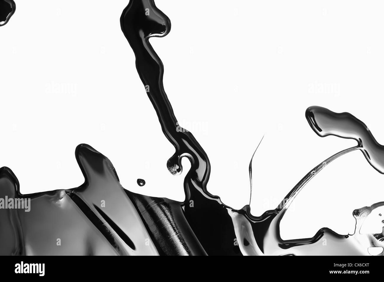 Spilled black paint making an abstract shape on white background Stock ...
