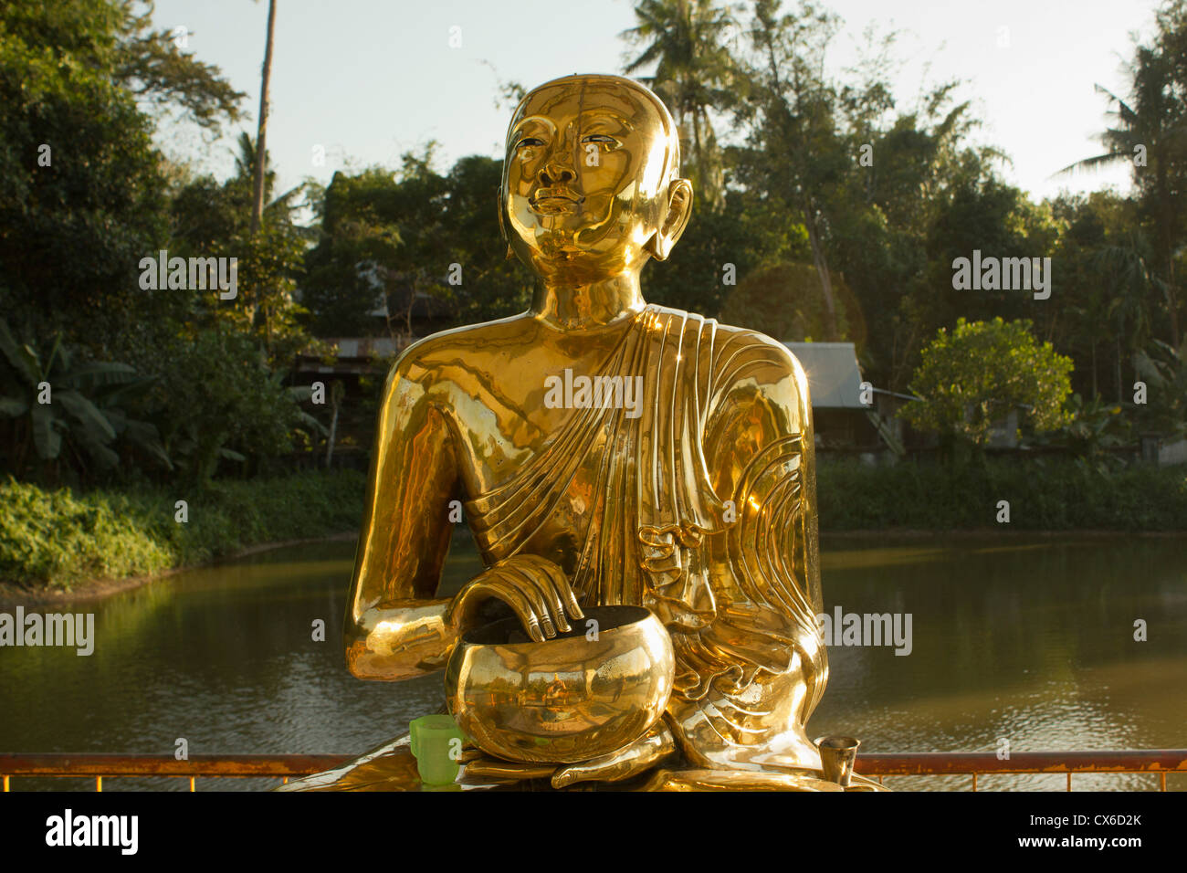 A gold Buddhist statue, Yangon, Burma Stock Photo