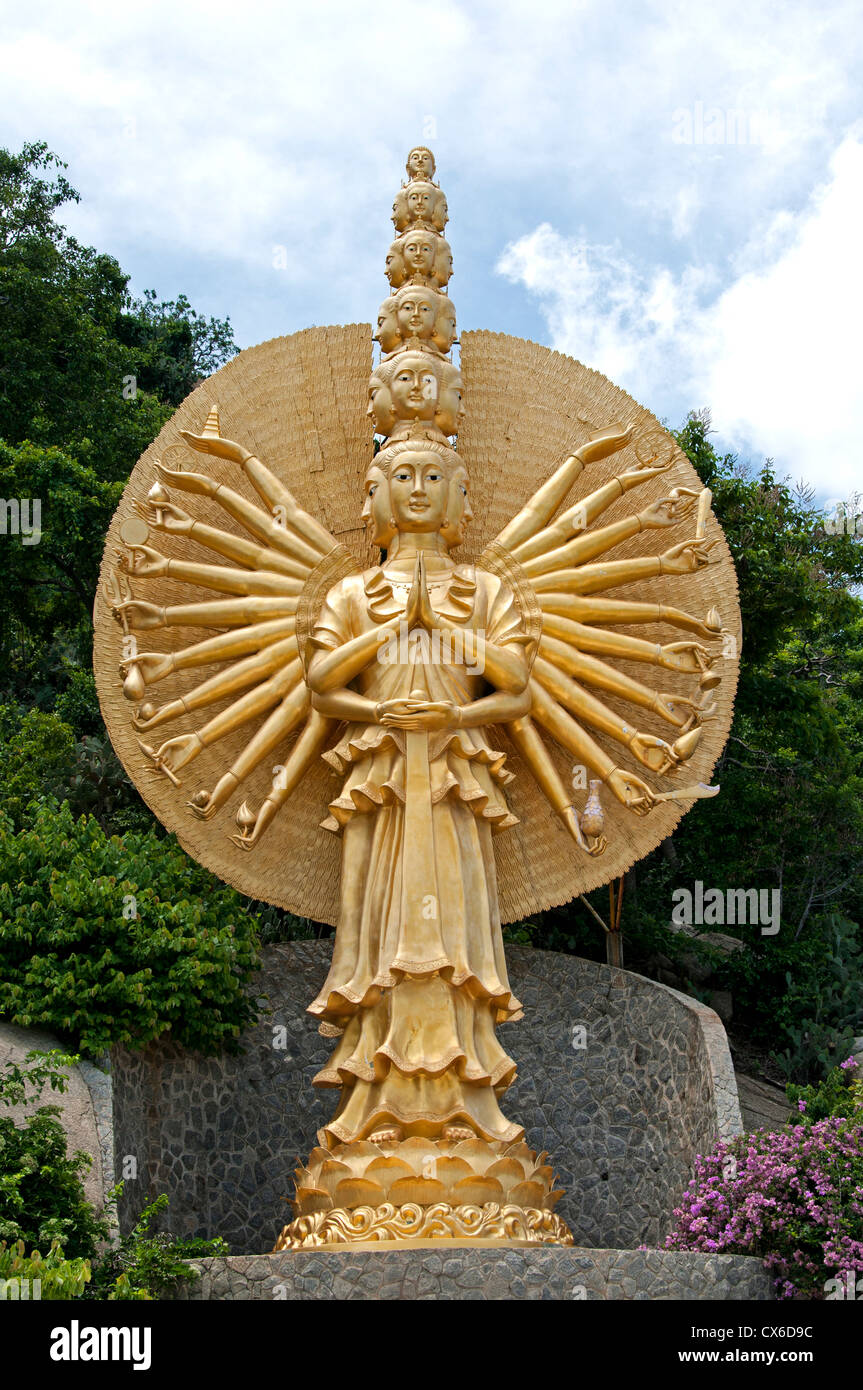 Ornate golden multi faced female deity with many arms Khao Takiab