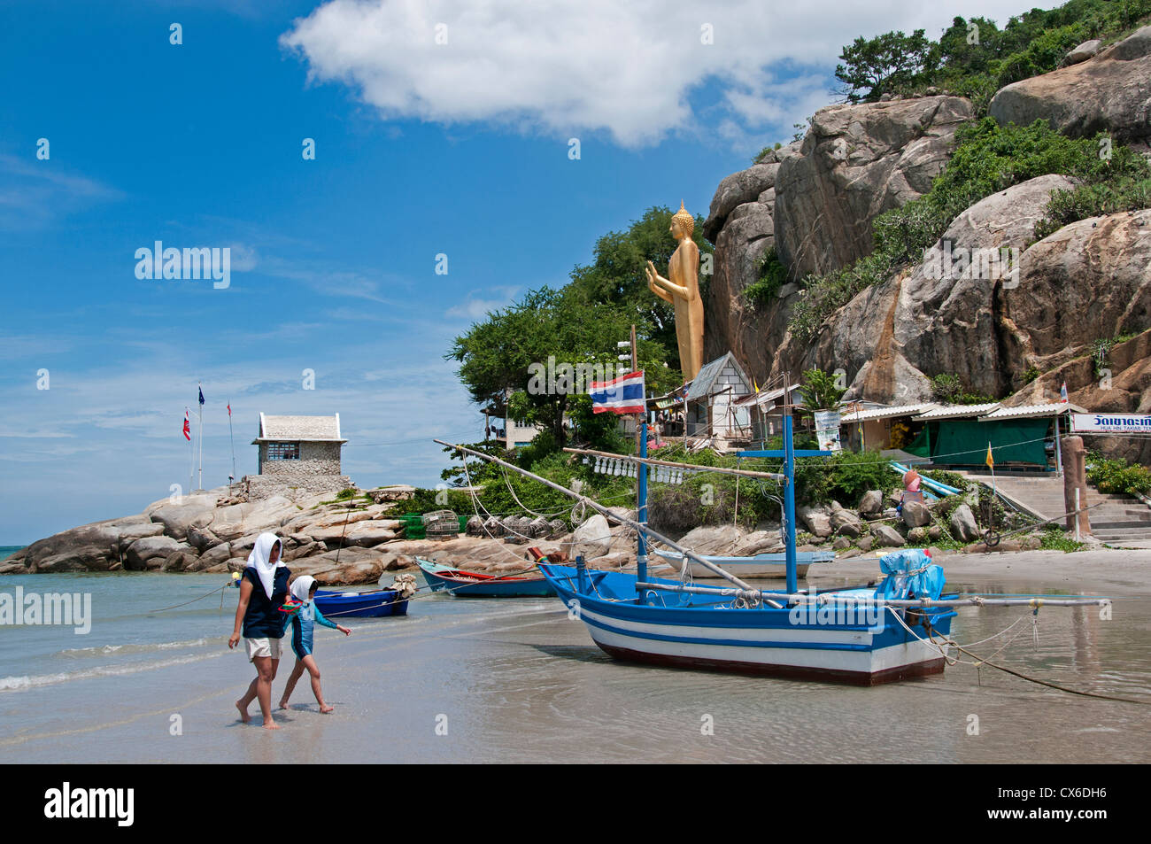 Beach Sea Water Large golden Buddha statue Khao Takiab Buddhist temple