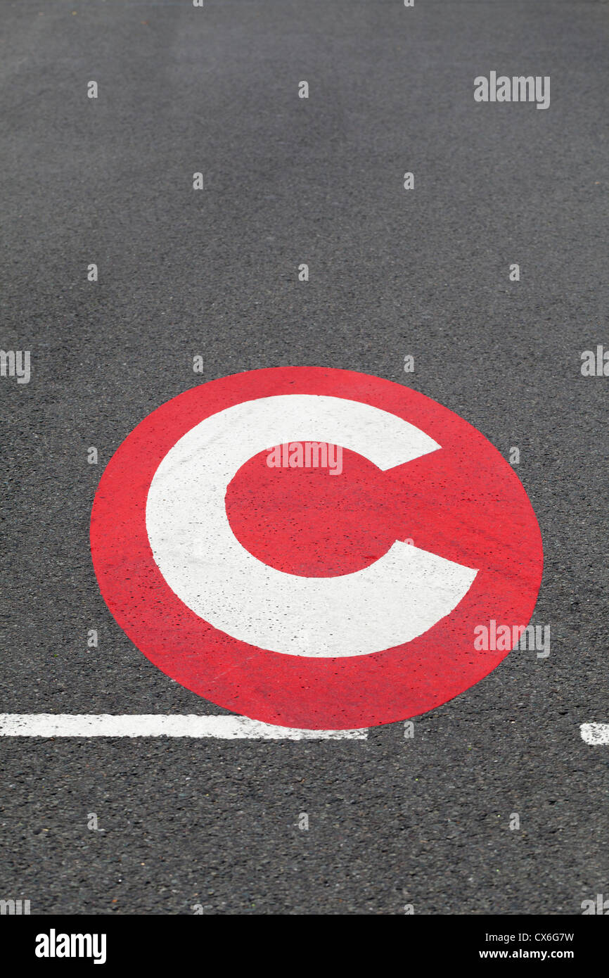 Congestion charge sign on the road, London, UK Stock Photo