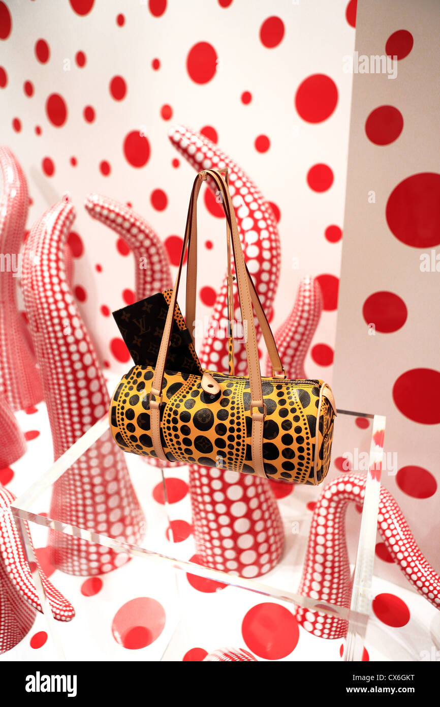 Handbag displayed at Louis Vuitton store in ION Orchard with collection by Japanese artist Yayoi Kusama Stock Photo