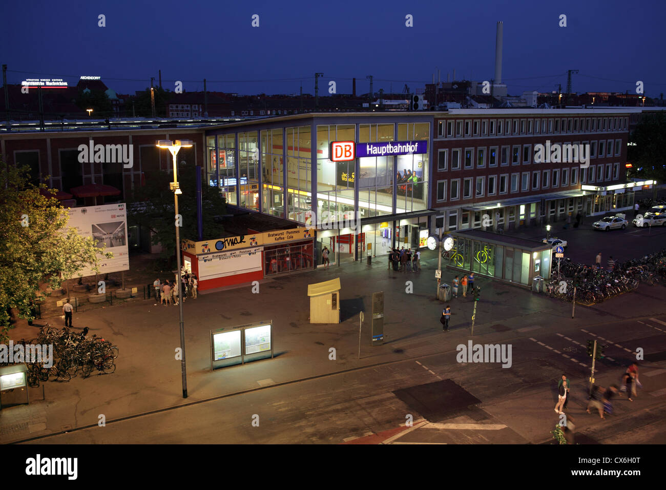 The entrance to the main railway station in Münster, Germany. At night. Stock Photo