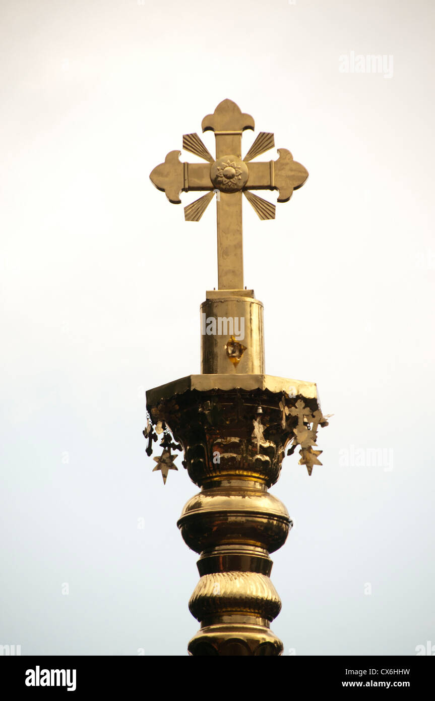 Gold plated holy cross Stock Photo