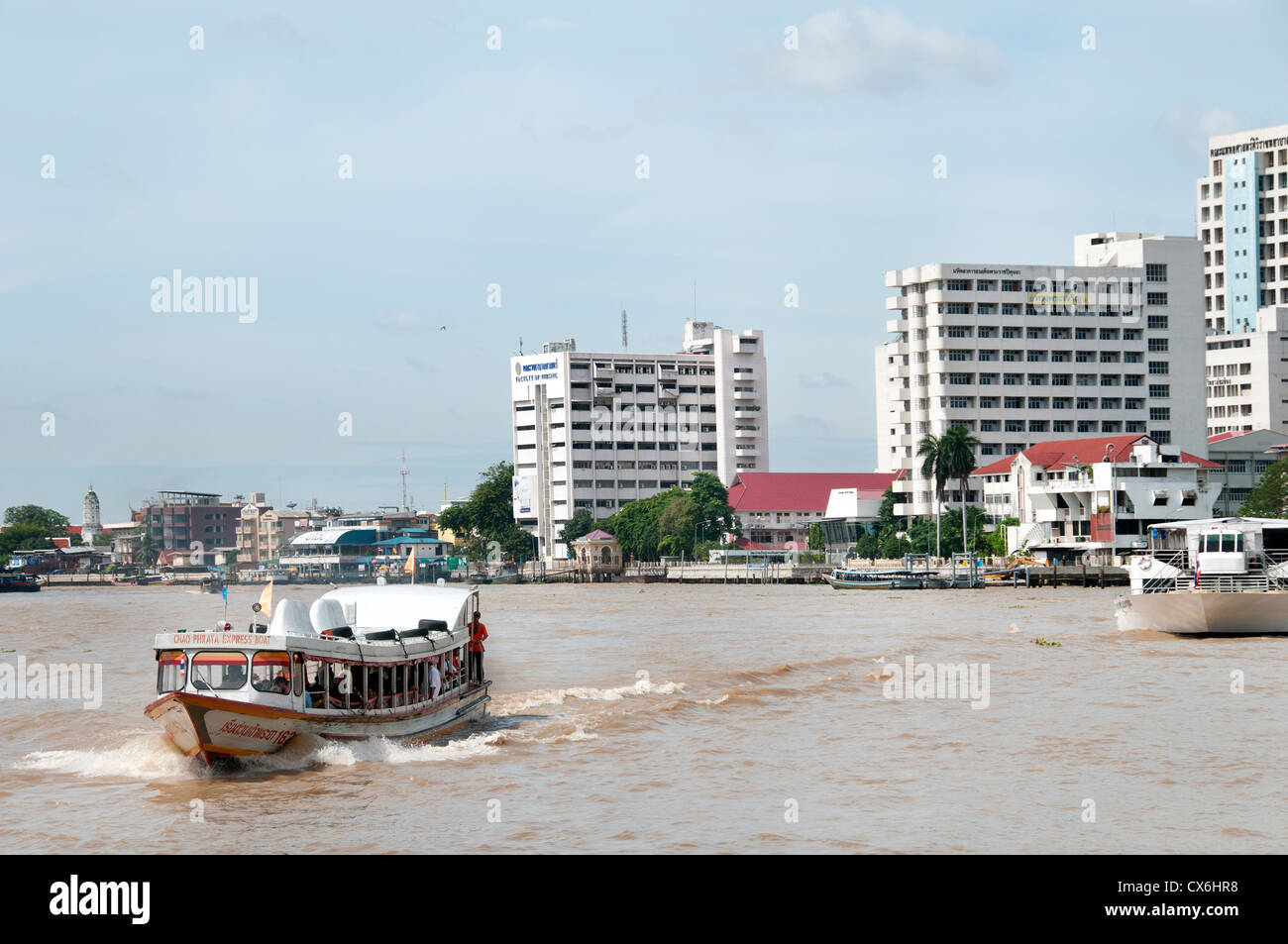 Traffic on the Chao Phraya River and Bangkok skyline Thailand Stock ...