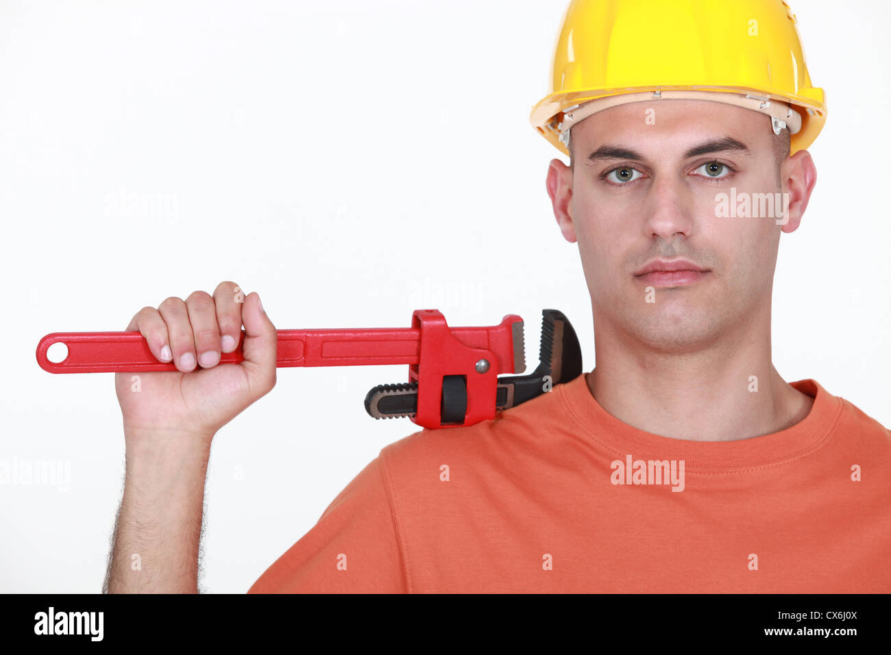 Man with an adjustable wrench Stock Photo Alamy