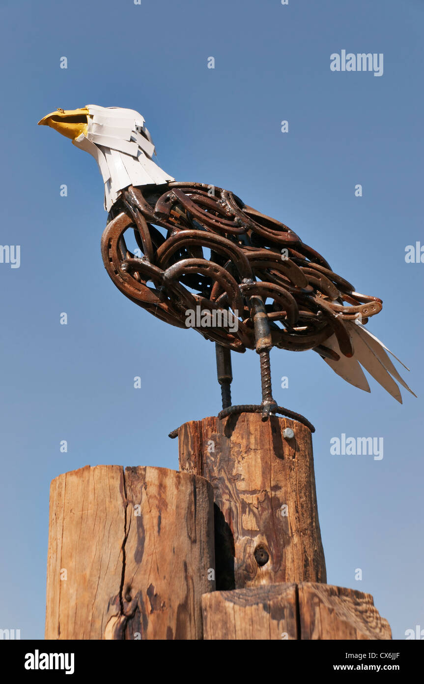 'Eagle' by Ray Evans with recycled found objects  is on display in downtown Olympia's waterfront Percival Plinth Project. Stock Photo