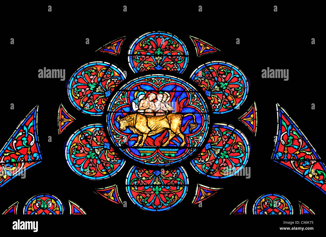 Paris, France. Notre Dame cathedral. Stained glass window. Worship of the golden bull / calf Stock Photo
