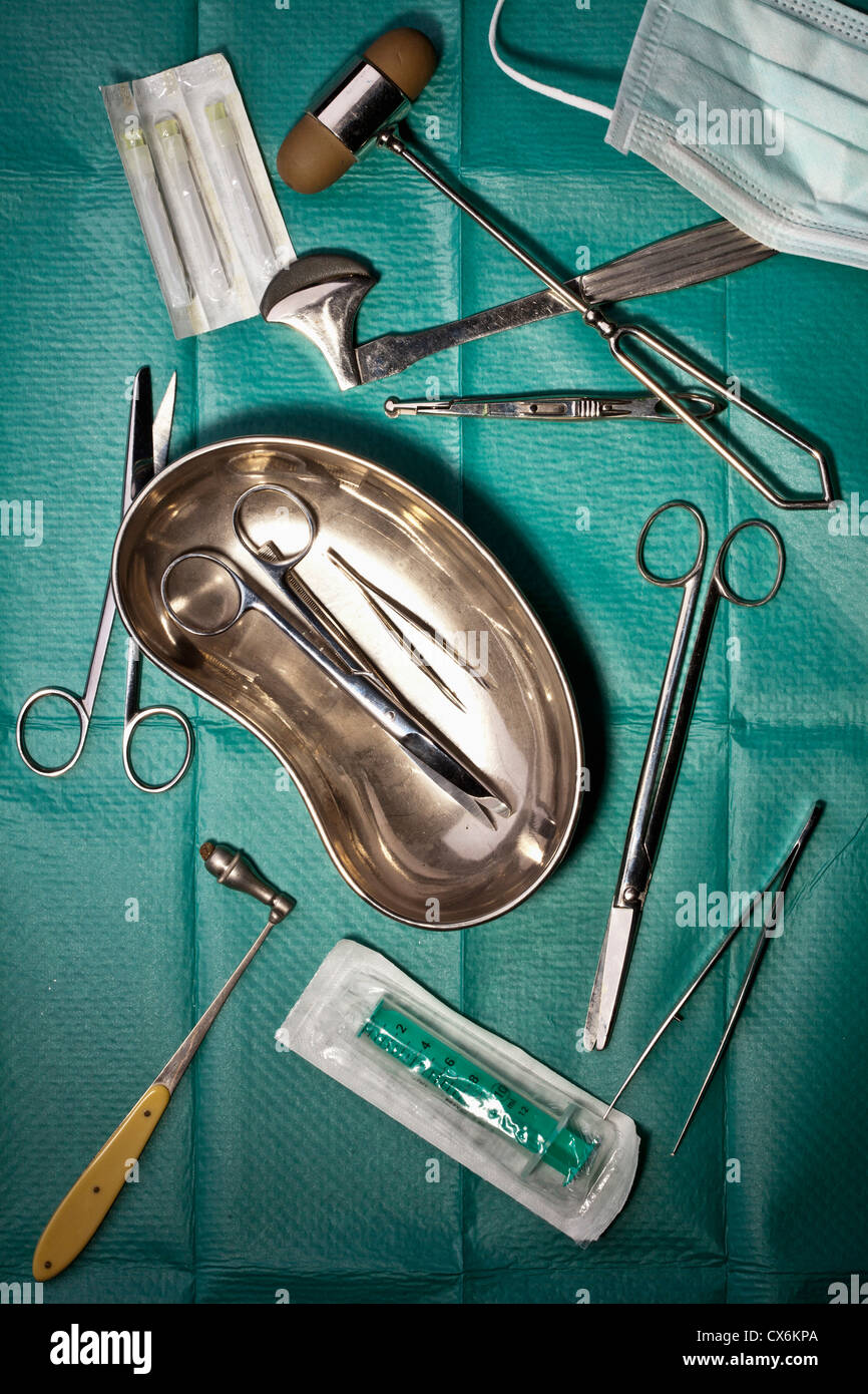 Various surgical instruments on a surgical drape Stock Photo Alamy