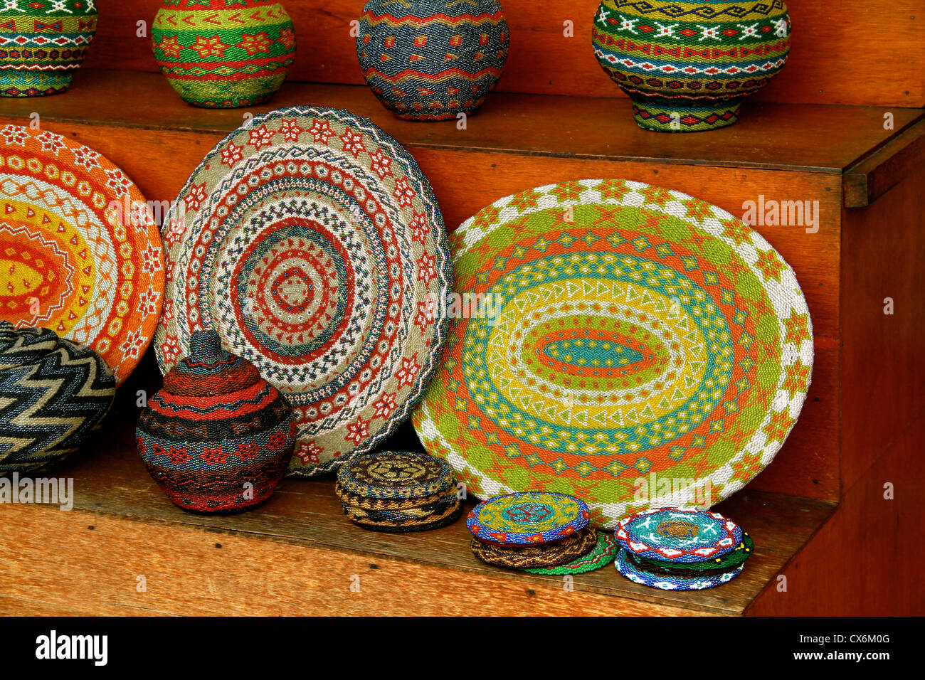 Colorful mas and coasters - handcrafted in Bali Stock Photo