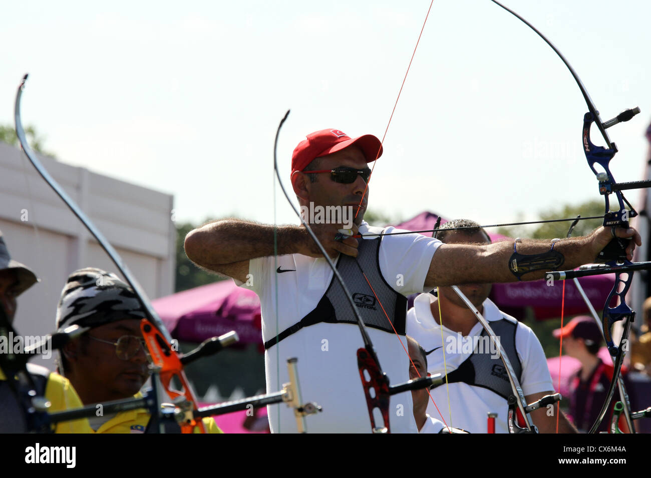 Zafer Korkmaz of Turkey in the Men's Team Recurve - Open archery at the Royal Artillery Barracks at London 2012 Paralympic games Stock Photo