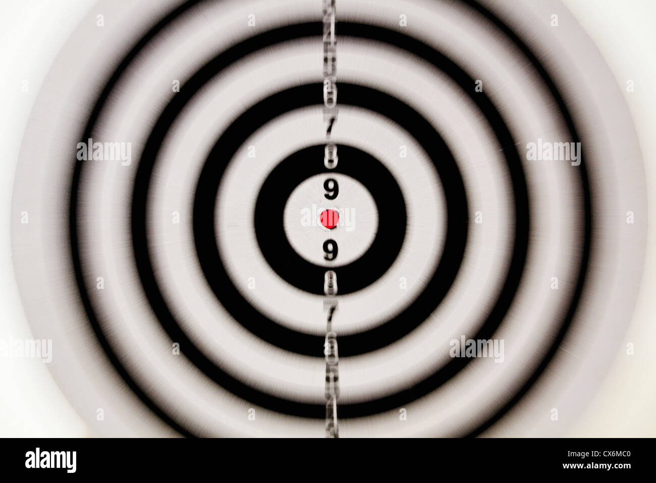 A target with a blurred focus except in the bull's eye Stock Photo