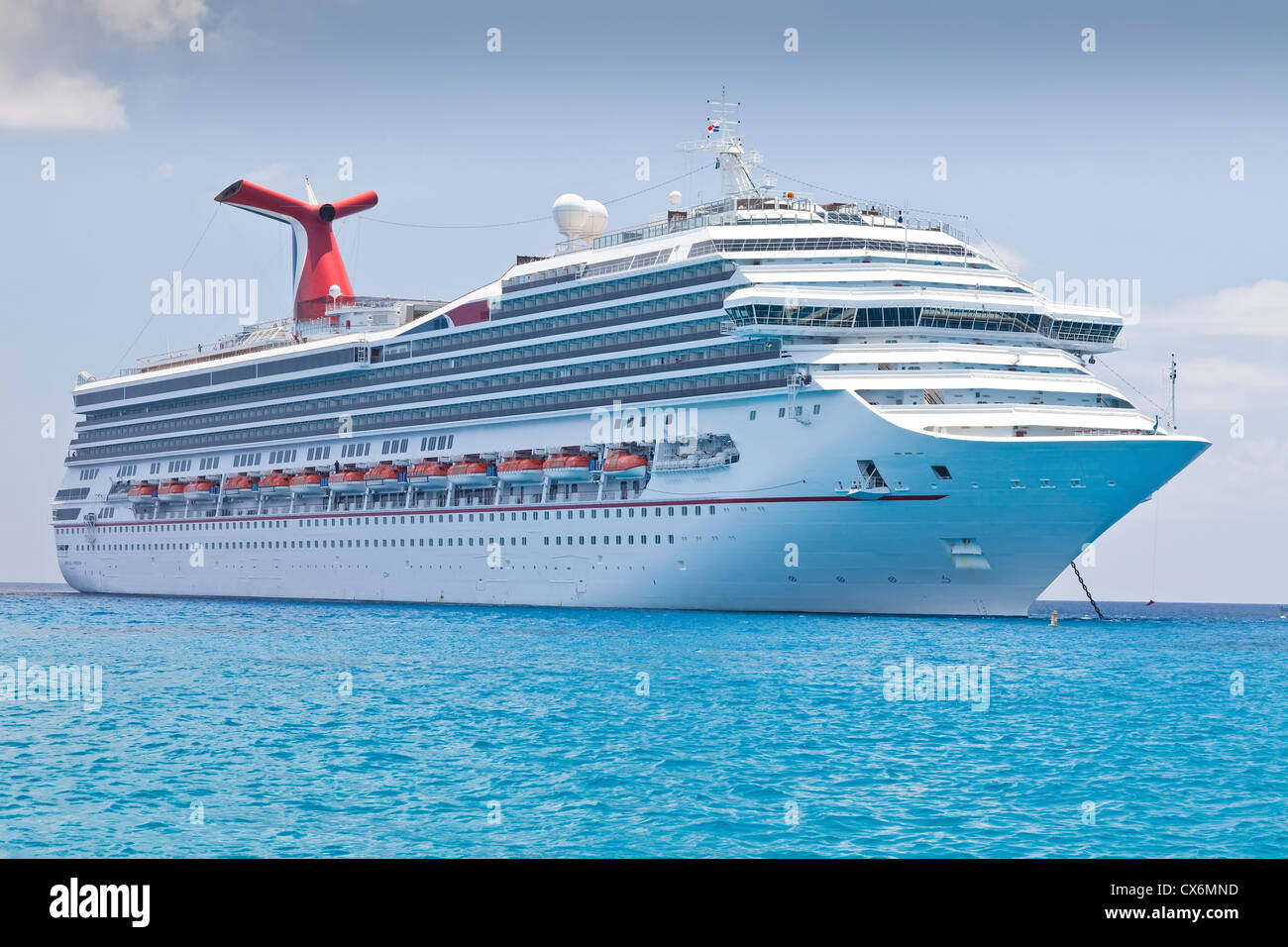 Luxury Cruise Ship anchored in the Eastern Caribbean Sea Stock Photo