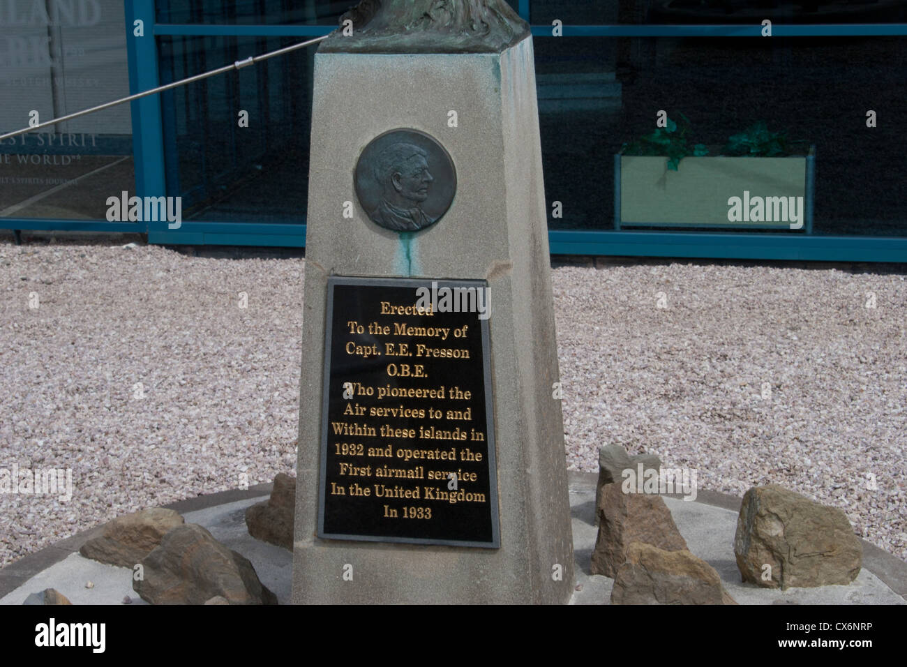 The plaque in front of Orkney airport stating that Capt EE Freeson pioneered air services to and within these islands in 1932. Stock Photo
