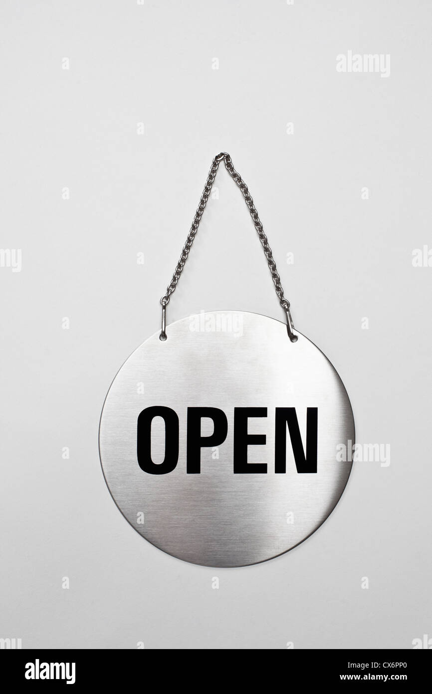 Open sign on silver chain Stock Photo