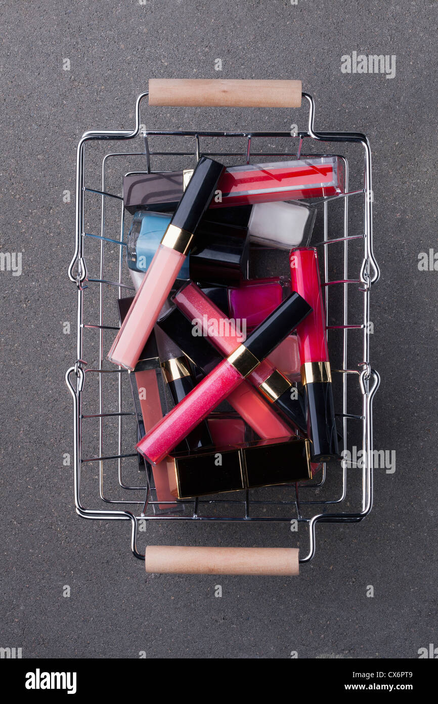 Cosmetics in shopping basket Stock Photo