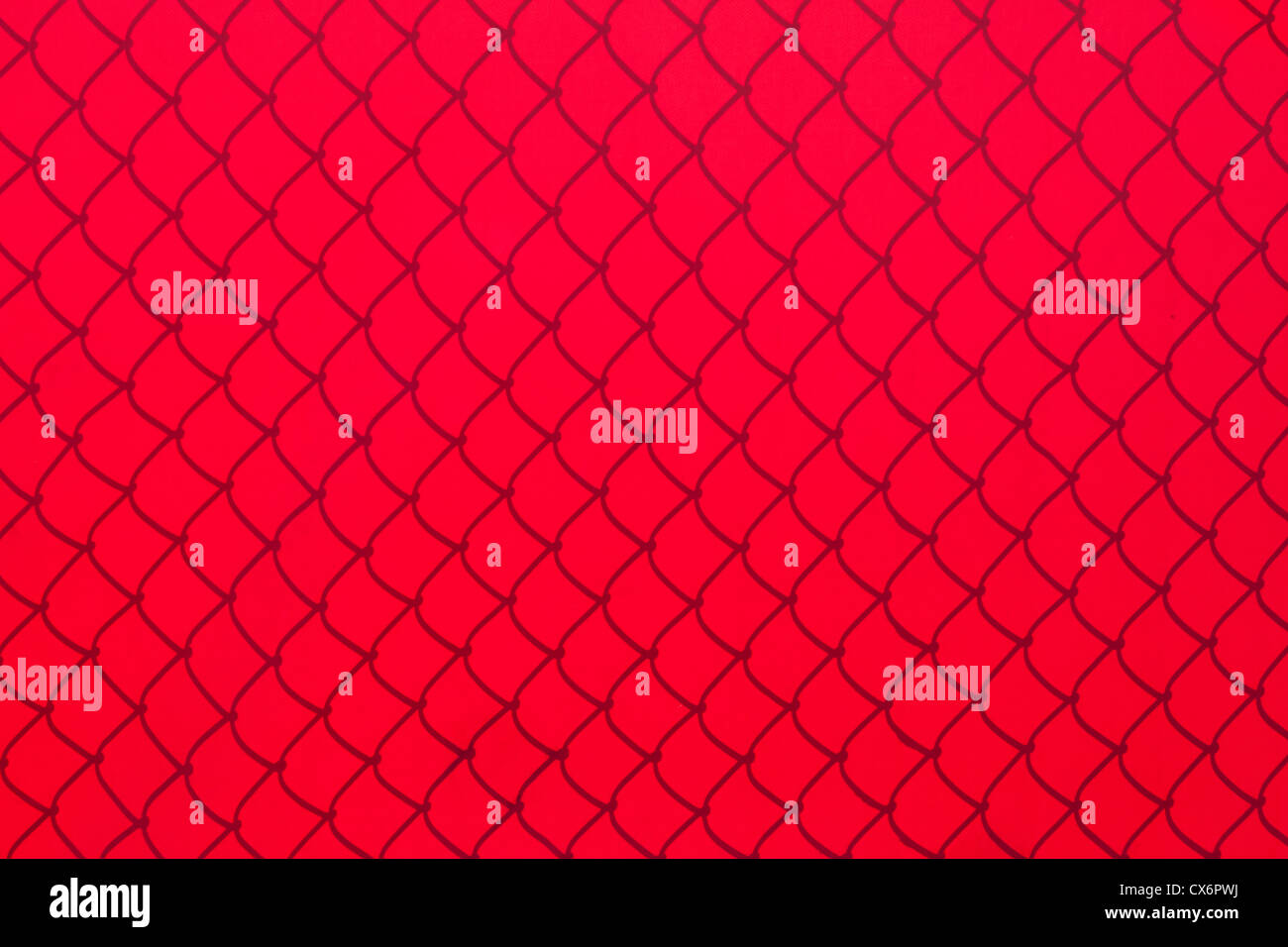 Chainlink Fence Shadow on red Shade Cloth Stock Photo
