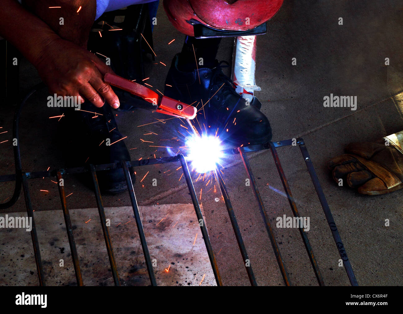 worker welding connecting square bar without gloves Stock Photo Alamy