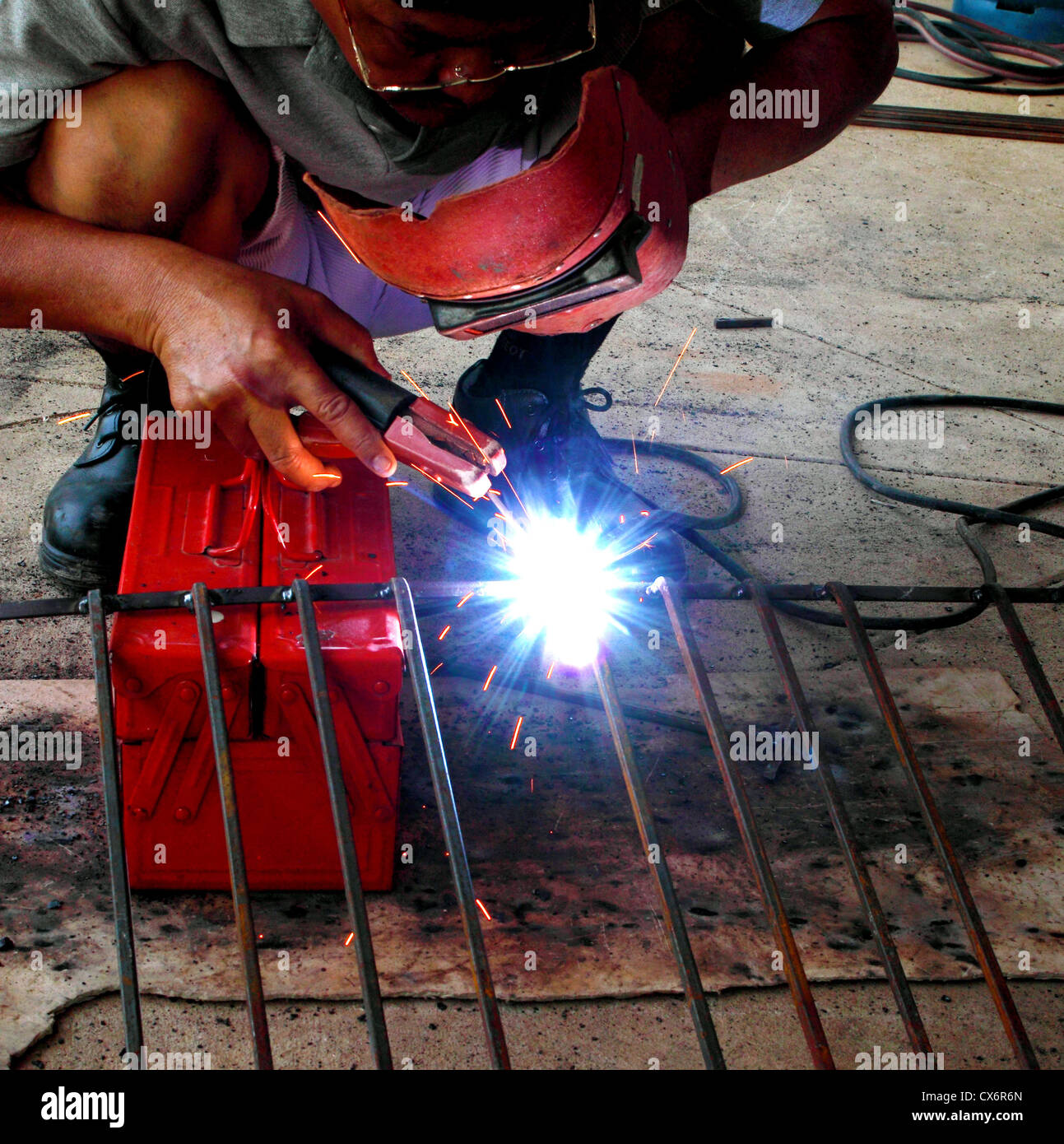 electric welding connecting square bar metal Stock Photo