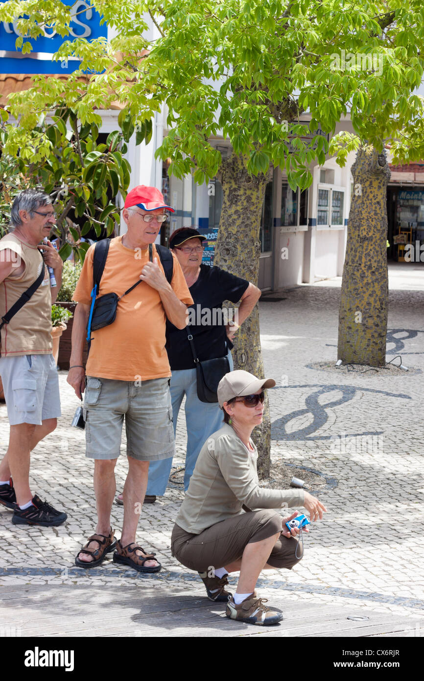 Senior people tourists at Ocean Village, Gibraltar, UK. Stock Photo